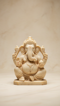 Marble Ganesha idol with hand-carved motifs